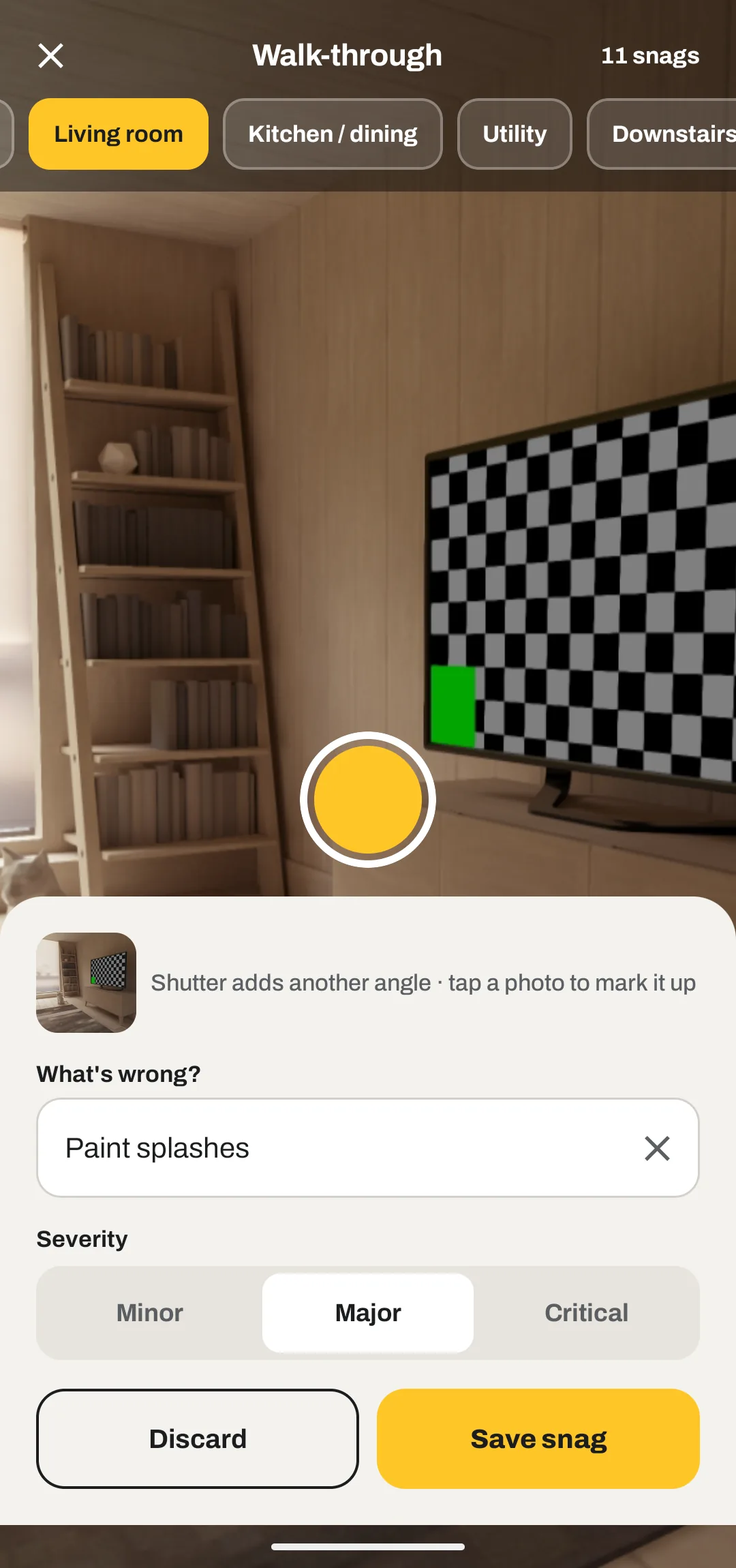 Snagbook walk-through camera with a snag being added